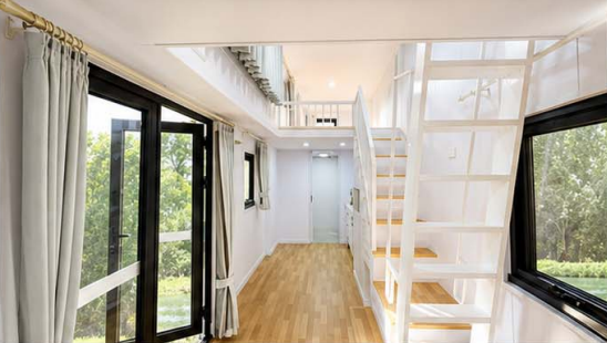 Florida living area and loft stairs